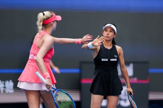 BEIJING, CHINA - OCTOBER 02: Miyu Kato of Japan and Fanny Stollar of Hungary react in the Women s Doubles Quarterfinal match against Timea Babos of Hungary and Luisa Stefani of Brazil on day 11 of the 2025 China Open at the National Tennis Center on October 2, 2025 in Beijing, China.  Copyright: xVCGx 111594598318