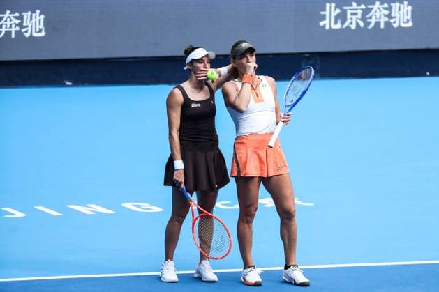 BEIJING, CHINA - OCTOBER 02: Timea Babos of Hungary and Luisa Stefani of Brazil react in the Women s Doubles Quarterfinal match against Miyu Kato of Japan and Fanny Stollar of Hungary on day 11 of the 2025 China Open at the National Tennis Center on October 2, 2025 in Beijing, China.  Copyright: xVCGx 111594601588
