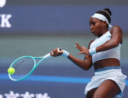 (251002) -- BEIJING, Oct. 2, 2025 -- Coco Gauff of the United States hits a return during the women s singles quarterfinal match between Coco Gauff of the United States and Eva Lys of Germany at 2025 China Open tennis tournament in Beijing, China, Oct. 2, 2025. ) (SP)CHINA-BEIJING-TENNIS-CHINA OPEN-WOMEN S SINGLES (CN) DuxXinyi 