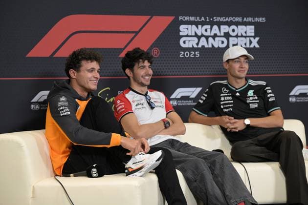 (251002) -- SINGAPORE, Oct. 2, 2025 -- McLaren s British driver Lando Norris (L), Haas French driver Esteban Ocon (C) and Mercedes British driver George Russell attend the pre-race press conference, PK, Pressekonferenz of the Formula 1 Singapore Grand Prix 2025, in Singapore, Oct. 2, 2025. (Photo by Xinhua) (SP)SINGAPORE-F1-SINGAPORE GRAND PRIX 2025-PRE-RACE PRESS ThenxChihxWey 