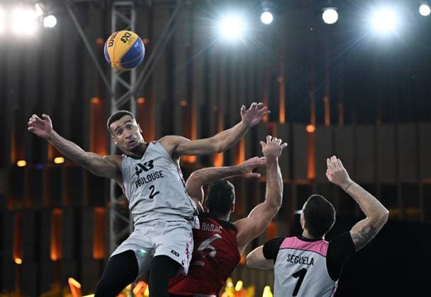 (251002) -- TIANJIN, Oct. 2, 2025 -- Paul Djoko (L) and Franck Seguela (R) of Toulouse vies with Nemanja Barac of Ub during the final match between Ub of Serbia and Toulouse of France at the International Basketball Federation (FIBA) 3x3 Tianjin Challenger in north China s Tianjin, Oct. 2, 2025. ) (SP)CHINA-TIANJIN-BASKETBALL-FIBA-TIANJIN CHALLENGER 3X3-FINALS (CN) SunxFanyue 