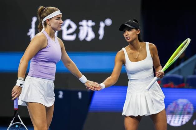 BEIJING, CHINA - OCTOBER 02: Priscilla Hon of Australia and Karolina Muchova of the Czech Republic react in the Women s Doubles Quarterfinal match against Danilina Anna of Kazakhstan and Krunic Aleksandra of Serbia on day 11 of the 2025 China Open at the National Tennis Center on October 2, 2025 in Beijing, China.  Copyright: xVCGx 111594659414
