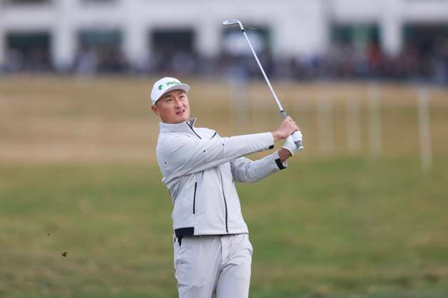 2nd October 2025; The Carnoustie Golf Links, Carnoustie, Angus, Scotland; Alfred Dunhill Links Golf Championship, Round One; Haotong Li of China plays a shot from the fairway on the first hole of Carnoustie Championship golf course during the first round of the Alfred Dunhill Links Championship  DavidxYoung
