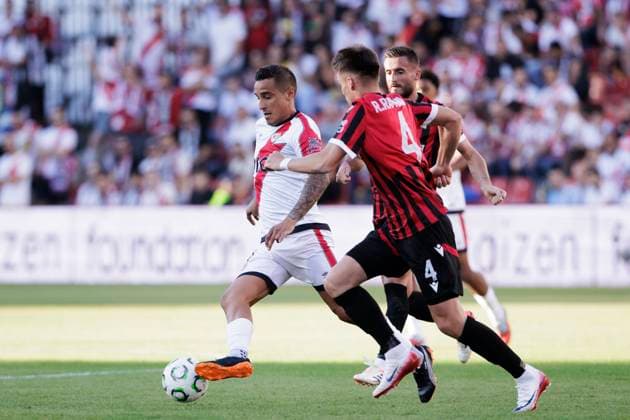 UEFA conference league - Rayo Vallecano vs KF Shkendija MADRID, SPAIN - October2: Oscar Trejo of Rayo Vallecano and Reshat Ramadani of Shkendija in action during the UEFA conference league 2025 26 match between Rayo Vallecano and KF Shkendija at Vallecas Stadium in Madrid. (Photo by Guillermo Martinez) Madrid Vallecas Stadium Spain Copyright: xGuillermoxMartinezx