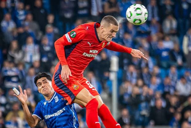 SOCCER - UEFA ECL, Poznan vs Rapid POZNAN,POLAND,02.OCT.25 - SOCCER - UEFA Conference League, KKS Lech Poznan vs SK Rapid Wien. Image shows Luis Palma (Poznan) and Nenad Cvetkovic (Rapid).  GEPAxpictures xKevinxHackner