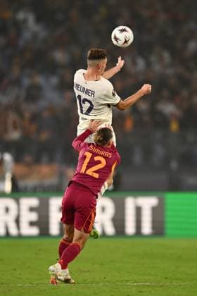 CALCIO - UEFA Europa League - AS Roma vs LOSC Lille Thomas Meunier of Lille Olympique S.C. and Kostas Tsimikas of A.S. Roma are in action during the UEFA Europa League phase day 2 football match between between A.S. Roma and Lille Olympique S.C. at the Olympic Stadium on October 2, 2025 in Rome, Italy. Rome Italy  Copyright: xIPAxSport ABACAx