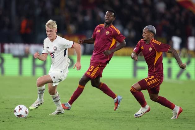 Football: UEFA League As Roma vs LOSC Lille Rome, Italy - October 2, 2025: Hakon Haraldsson of Lille, Evan Ndicka of Roma, Wesley Franca of Roma seen in action during the UEFA League 2025 2026, day 2, between AS Roma vs LOSC Lille at Olympic stadium in Rome ROME OLYMPIC STADIUM italy italy Copyright: xmarcoxiacobucci