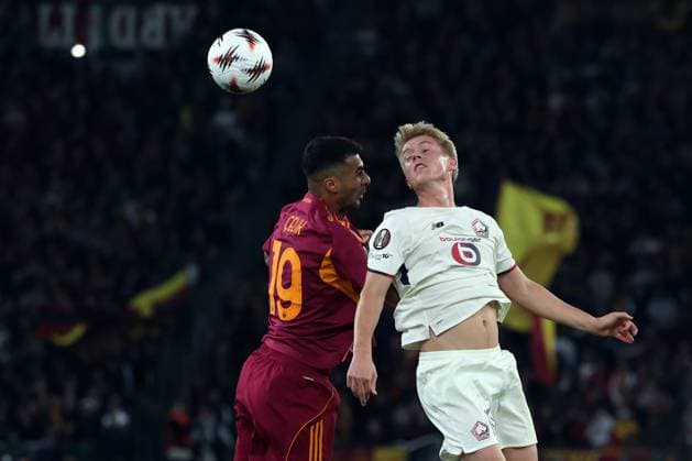 Football: UEFA League As Roma vs LOSC Lille Rome, Italy - October 2, 2025: Zeki Celik of Roma, Hakon Haraldsson of Lille seen in action during the UEFA League 2025 2026, day 2, between AS Roma vs LOSC Lille at Olympic stadium in Rome ROME OLYMPIC STADIUM italy italy Copyright: xmarcoxiacobucci