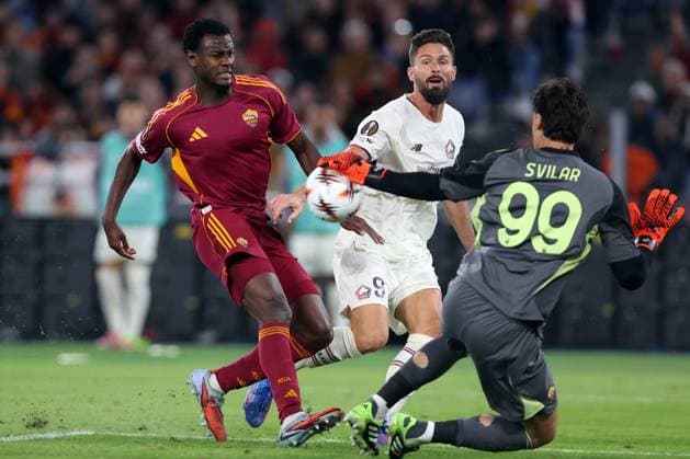 Football: UEFA League As Roma vs LOSC Lille Rome, Italy - October 2, 2025: Evan Ndicka of Roma, Olivier Giroud of Lille, Mille Svilar of Roma seen in action during the UEFA League 2025 2026, day 2, between AS Roma vs LOSC Lille at Olympic stadium in Rome ROME OLYMPIC STADIUM italy italy Copyright: xmarcoxiacobucci