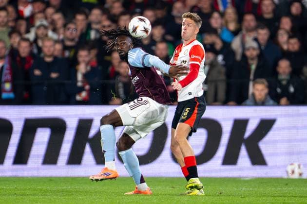 2025-10-02 Feyenoord v Aston Villa FC - UEFA Europa League 2025 26 League Phase MD2 STADION FEIJENOORD, NETHERLANDS - OCTOBER 2: Evann Guessand of Aston Villa FC battles for the ball with Gijs Smal of Feyenoord during the UEFA Europa League 2025 26 League Phase MD2 match between Feyenoord and Aston Villa FC at Rotterdam on October 2, 2025 in Stadion Feijenoord, Netherlands. Stadion Feijenoord Rotterdam Netherlands Content not available for redistribution in The Netherlands directly or indirectly through any third parties. Copyright: xJorisxVerwijstx