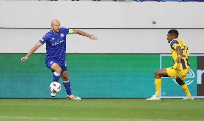 Maccabi Tel-Aviv FC and GNK Dinamo Zagreb - UEFA Europa League 2025 26 League Phase MD2 Josip Misic of GNK Dinamo Zagreb is challeged by Helio Varela of GNK Dinamo ZAgreb during the UEFA Europa League 2025 26 League Phase MD2 match between Maccabi Tel-Aviv FC and GNK Dinamo Zagreb at TSC Arena on October 2, 2025 in Backa Topola, Serbia.  SlobodanxSandic PIXSELL