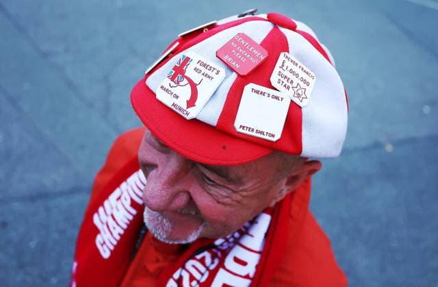A Nottingham Forest fan wearing a hat with large badges on Nottingham Forest v Midtjylland, UEFA Europa League, Group Stage, Football, City Ground, Nottingham, UK - 02 Oct 2025Nottingham City Ground United Kingdom EDITORIAL USE ONLY No use with unauthorised audio, video, data, fixture lists, club league logos or live services. Online in-match use limited to 120 images, no video emulation. No use in betting, games or single club league player publications.  Copyright: xMattxWest Shutterstockx 15504058j