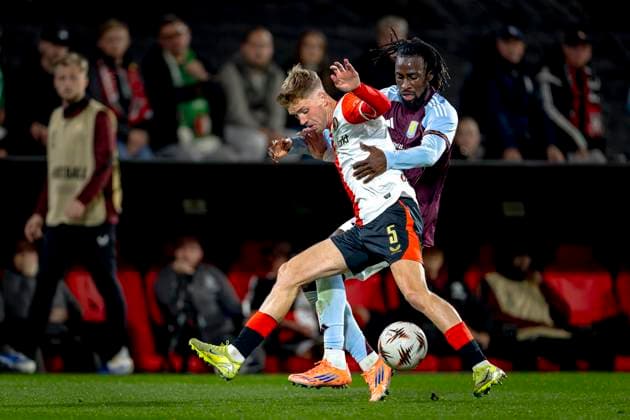 SC Feyenoord Rotterdam defender Gijs Smal, Aston Villa FC forwarder Evann Guessand during the match SC Feyenoord Rotterdam vs Aston Villa FC at the Stadium De Kuip for the Europa League - League phase - Matchday 2 season 2025-2026 in ROTTERDAM, Netherlands on 2 oktober 2025, (photo by Marcel van Dorst EYE4images DeFodi Images) SC Feyenoord Rotterdam defender Gijs Smal, Aston Villa FC forwarder Evann Guessand during the match SC Feyenoord Rotterdam vs Aston Villa FC at the Stadium De Kuip for the Europa League League phase Matchday 2 season 2025 2026 in ROTTERDAM, Netherlands on 2 oktober 2025, photo by Marcel van Dorst EYE4images DeFodi Images