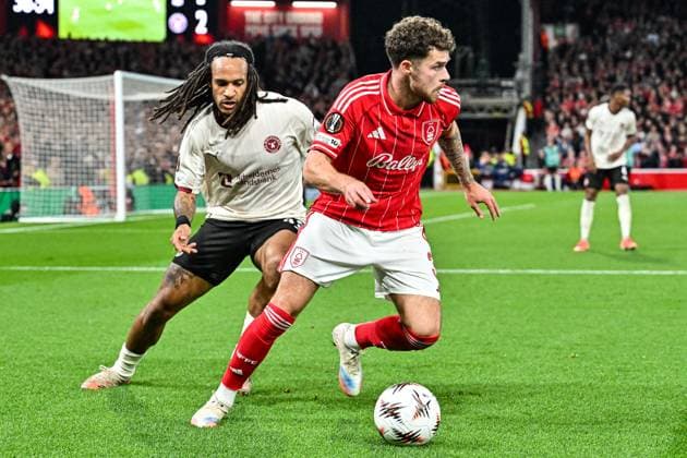 2nd October 2025; The City Ground, Nottingham, England; UEFA Europa League Football, Nottingham Forest versus Midtjylland; Neco Williams of Nottingham Forest cuts back against Kevin Mbabu of FC Midtjylland  GodfreyxPitt