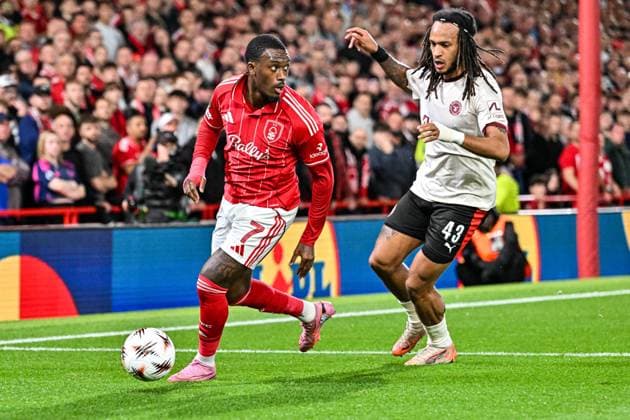 2nd October 2025; The City Ground, Nottingham, England; UEFA Europa League Football, Nottingham Forest versus Midtjylland; Callum Hudson-Odoi of Nottingham Forest holds off Kevin Mbabu of FC Midtjylland  GodfreyxPitt