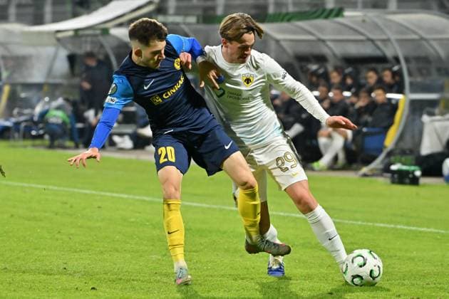 Celje, Slovenia, October 02nd 2025, Nikita Iosifov of Celje (L) in action against James Penrice of AEK Athens (R) during the UEFA Conference League, League phase Matchday 1, between Celje (Slovenia) and AEK Athens (Greece) at Stadion Celje, Celje, Slovenia. (Photo by Igor Kupljenik Sports Press Photo) Copyright: xIgorxKupljenikx xSPPx Sportspressphoto_SPR36760