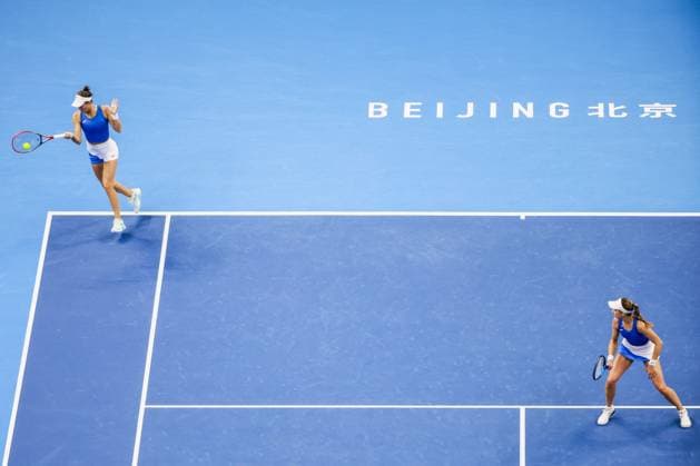 BEIJING, CHINA - OCTOBER 03: Tereza Mihalikova of Slovakia and Olivia Nicholls of Great Britain compete in the Women s Doubles Quarterfinal match against Hsieh Su-wei of Chinese Taipei and Jelena Ostapenko of Latvia on day 12 of the 2025 China Open at the National Tennis Center on October 3, 2025 in Beijing, China.  Copyright: xVCGx 111594807268