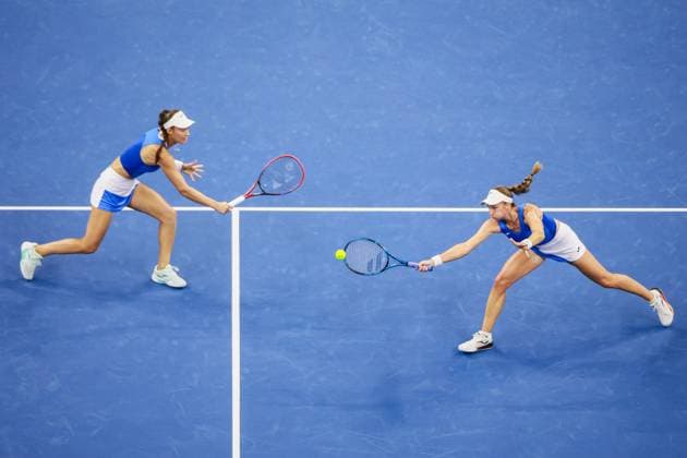BEIJING, CHINA - OCTOBER 03: Tereza Mihalikova of Slovakia and Olivia Nicholls of Great Britain compete in the Women s Doubles Quarterfinal match against Hsieh Su-wei of Chinese Taipei and Jelena Ostapenko of Latvia on day 12 of the 2025 China Open at the National Tennis Center on October 3, 2025 in Beijing, China.  Copyright: xVCGx 111594807301