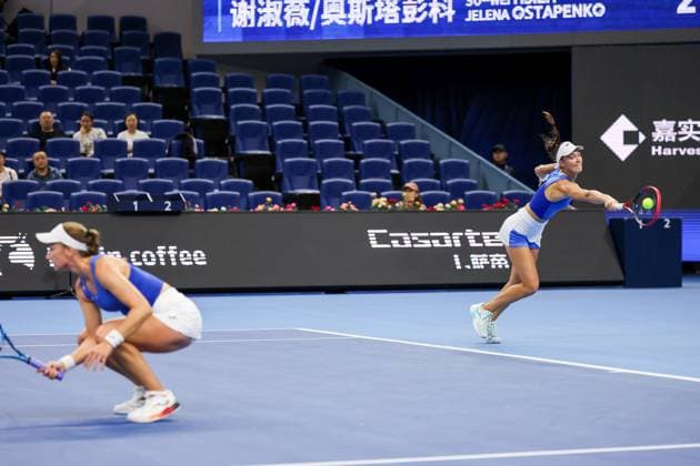 BEIJING, CHINA - OCTOBER 03: Tereza Mihalikova of Slovakia and Olivia Nicholls of Great Britain compete in the Women s Doubles Quarterfinal match against Hsieh Su-wei of Chinese Taipei and Jelena Ostapenko of Latvia on day 12 of the 2025 China Open at the National Tennis Center on October 3, 2025 in Beijing, China.  Copyright: xVCGx 111594807670