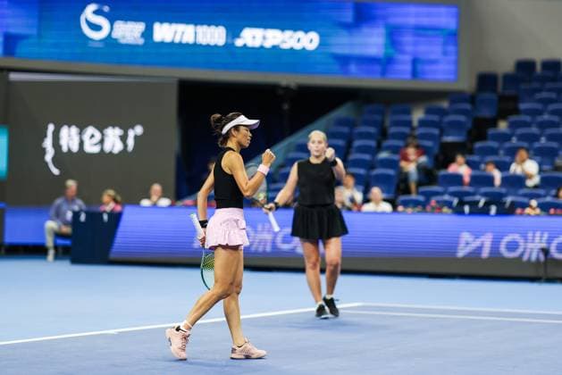 BEIJING, CHINA - OCTOBER 03: Hsieh Su-wei of Chinese Taipei and Jelena Ostapenko of Latvia react in the Women s Doubles Quarterfinal match against Tereza Mihalikova of Slovakia and Olivia Nicholls of Great Britain on day 12 of the 2025 China Open at the National Tennis Center on October 3, 2025 in Beijing, China.  Copyright: xVCGx 111594807672