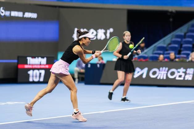 BEIJING, CHINA - OCTOBER 03: Hsieh Su-wei of Chinese Taipei and Jelena Ostapenko of Latvia compete in the Women s Doubles Quarterfinal match against Tereza Mihalikova of Slovakia and Olivia Nicholls of Great Britain on day 12 of the 2025 China Open at the National Tennis Center on October 3, 2025 in Beijing, China.  Copyright: xVCGx 111594807680