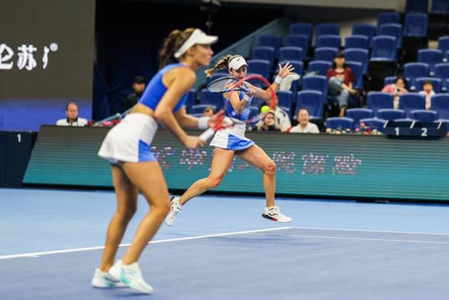 BEIJING, CHINA - OCTOBER 03: Tereza Mihalikova of Slovakia and Olivia Nicholls of Great Britain compete in the Women s Doubles Quarterfinal match against Hsieh Su-wei of Chinese Taipei and Jelena Ostapenko of Latvia on day 12 of the 2025 China Open at the National Tennis Center on October 3, 2025 in Beijing, China.  Copyright: xVCGx 111594807684