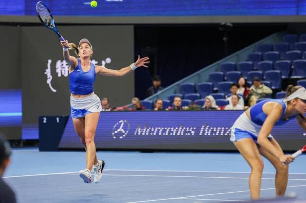 BEIJING, CHINA - OCTOBER 03: Tereza Mihalikova of Slovakia and Olivia Nicholls of Great Britain compete in the Women s Doubles Quarterfinal match against Hsieh Su-wei of Chinese Taipei and Jelena Ostapenko of Latvia on day 12 of the 2025 China Open at the National Tennis Center on October 3, 2025 in Beijing, China.  Copyright: xVCGx 111594808545