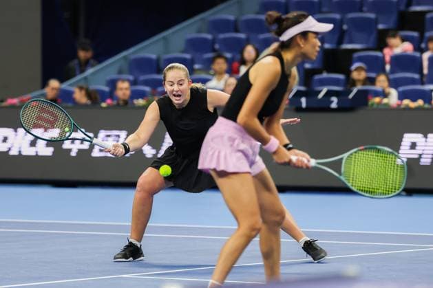 BEIJING, CHINA - OCTOBER 03: Hsieh Su-wei of Chinese Taipei and Jelena Ostapenko of Latvia compete in the Women s Doubles Quarterfinal match against Tereza Mihalikova of Slovakia and Olivia Nicholls of Great Britain on day 12 of the 2025 China Open at the National Tennis Center on October 3, 2025 in Beijing, China.  Copyright: xVCGx 111594808585