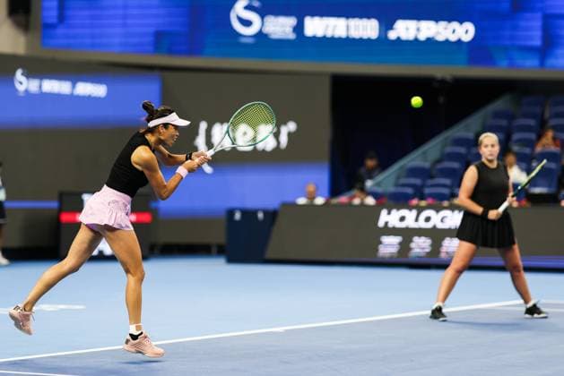 BEIJING, CHINA - OCTOBER 03: Hsieh Su-wei of Chinese Taipei and Jelena Ostapenko of Latvia compete in the Women s Doubles Quarterfinal match against Tereza Mihalikova of Slovakia and Olivia Nicholls of Great Britain on day 12 of the 2025 China Open at the National Tennis Center on October 3, 2025 in Beijing, China.  Copyright: xVCGx 111594804505