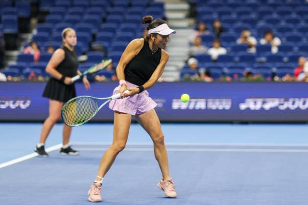 BEIJING, CHINA - OCTOBER 03: Hsieh Su-wei of Chinese Taipei and Jelena Ostapenko of Latvia compete in the Women s Doubles Quarterfinal match against Tereza Mihalikova of Slovakia and Olivia Nicholls of Great Britain on day 12 of the 2025 China Open at the National Tennis Center on October 3, 2025 in Beijing, China.  Copyright: xVCGx 111594804841