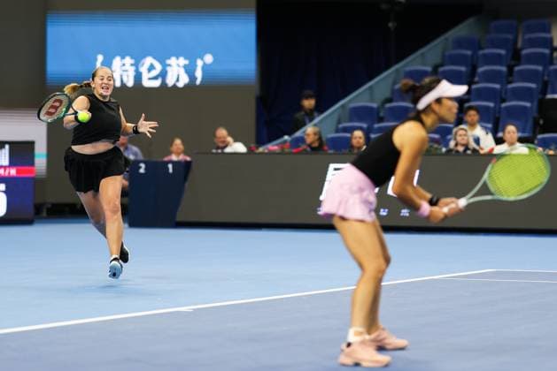 BEIJING, CHINA - OCTOBER 03: Hsieh Su-wei of Chinese Taipei and Jelena Ostapenko of Latvia compete in the Women s Doubles Quarterfinal match against Tereza Mihalikova of Slovakia and Olivia Nicholls of Great Britain on day 12 of the 2025 China Open at the National Tennis Center on October 3, 2025 in Beijing, China.  Copyright: xVCGx 111594809762