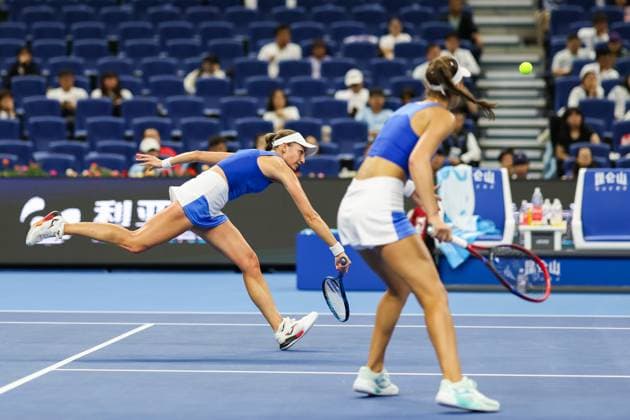 BEIJING, CHINA - OCTOBER 03: Tereza Mihalikova of Slovakia and Olivia Nicholls of Great Britain compete in the Women s Doubles Quarterfinal match against Hsieh Su-wei of Chinese Taipei and Jelena Ostapenko of Latvia on day 12 of the 2025 China Open at the National Tennis Center on October 3, 2025 in Beijing, China.  Copyright: xVCGx 111594809778