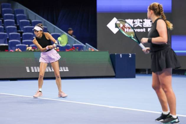 BEIJING, CHINA - OCTOBER 03: Hsieh Su-wei of Chinese Taipei and Jelena Ostapenko of Latvia compete in the Women s Doubles Quarterfinal match against Tereza Mihalikova of Slovakia and Olivia Nicholls of Great Britain on day 12 of the 2025 China Open at the National Tennis Center on October 3, 2025 in Beijing, China.  Copyright: xVCGx 111594805246