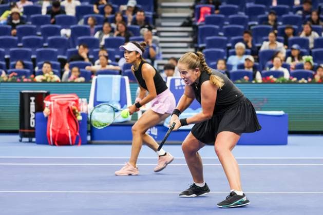 BEIJING, CHINA - OCTOBER 03: Hsieh Su-wei of Chinese Taipei and Jelena Ostapenko of Latvia compete in the Women s Doubles Quarterfinal match against Tereza Mihalikova of Slovakia and Olivia Nicholls of Great Britain on day 12 of the 2025 China Open at the National Tennis Center on October 3, 2025 in Beijing, China.  Copyright: xVCGx 111594805273