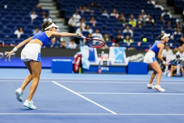 BEIJING, CHINA - OCTOBER 03: Tereza Mihalikova of Slovakia and Olivia Nicholls of Great Britain compete in the Women s Doubles Quarterfinal match against Hsieh Su-wei of Chinese Taipei and Jelena Ostapenko of Latvia on day 12 of the 2025 China Open at the National Tennis Center on October 3, 2025 in Beijing, China.  Copyright: xVCGx 111594804794