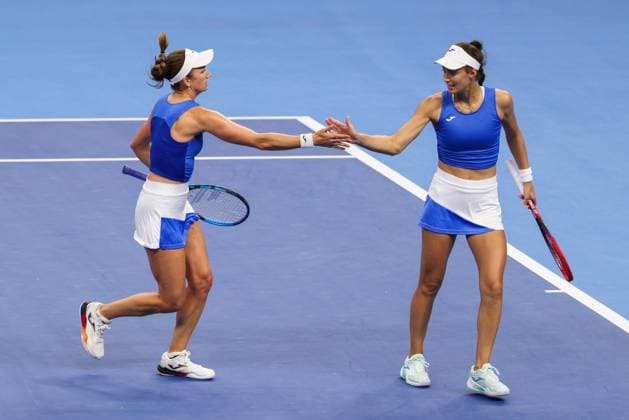 BEIJING, CHINA - OCTOBER 03: Tereza Mihalikova of Slovakia and Olivia Nicholls of Great Britain compete in the Women s Doubles Quarterfinal match against Hsieh Su-wei of Chinese Taipei and Jelena Ostapenko of Latvia on day 12 of the 2025 China Open at the National Tennis Center on October 3, 2025 in Beijing, China.  Copyright: xVCGx 111594810968