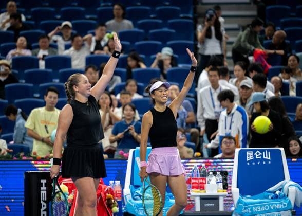(251003) -- BEIJING, Oct. 3, 2025 -- Hsieh Su-Wei (R) Jelena Ostapenko celebrate after the women s doubles quarterfinal match between Hsieh Su-Wei (Chinese Taipei) Jelena Ostapenko (Latvia) and Tereza Mihalikova (Slovakia) Olivia Nicholls (Britain) at 2025 China Open tennis tournament in Beijing, China, Oct. 3, 2025. ) (SP)CHINA-BEIJING-TENNIS-CHINA OPEN-WOMEN S DOUBLES-QUARTERFINAL (CN) HuxJingwen 