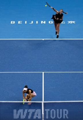 (251003) -- BEIJING, Oct. 3, 2025 -- Hsieh Su-Wei Jelena Ostapenko (up) compete during the women s doubles quarterfinal match between Hsieh Su-Wei (Chinese Taipei) Jelena Ostapenko (Latvia) and Tereza Mihalikova (Slovakia) Olivia Nicholls (Britain) at 2025 China Open tennis tournament in Beijing, China, Oct. 3, 2025. ) (SP)CHINA-BEIJING-TENNIS-CHINA OPEN-WOMEN S DOUBLES-QUARTERFINAL (CN) HuxJingwen 