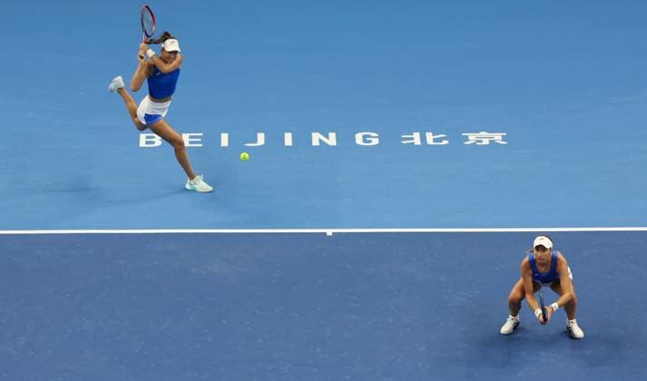 (251003) -- BEIJING, Oct. 3, 2025 -- Tereza Mihalikova (L) Olivia Nicholls compete during the women s doubles quarterfinal match between Hsieh Su-Wei (Chinese Taipei) Jelena Ostapenko (Latvia) and Tereza Mihalikova (Slovakia) Olivia Nicholls (Britain) at 2025 China Open tennis tournament in Beijing, China, Oct. 3, 2025. (Photo by Xinhua) (SP)CHINA-BEIJING-TENNIS-CHINA OPEN-WOMEN S DOUBLES-QUARTERFINAL (CN) MaxZihan 