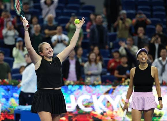 (251003) -- BEIJING, Oct. 3, 2025 -- Hsieh Su-Wei (R) Jelena Ostapenko react after the women s doubles quarterfinal match between Hsieh Su-Wei (Chinese Taipei) Jelena Ostapenko (Latvia) and Tereza Mihalikova (Slovakia) Olivia Nicholls (Britain) at 2025 China Open tennis tournament in Beijing, China, Oct. 3, 2025. (Photo by Xinhua) (SP)CHINA-BEIJING-TENNIS-CHINA OPEN-WOMEN S DOUBLES-QUARTERFINAL (CN) MaxZihan 