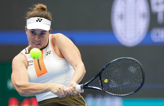 (251003) -- BEIJING, Oct. 3, 2025 -- Linda Noskova hits a return during the women s singles quarterfinal match between Linda Noskova of the Czech Reoublic and Sonay Kartal of Britain at 2025 China Open tennis tournament in Beijing, China, Oct. 3, 2025. (Photo by Xinhua) (SP)CHINA-BEIJING-TENNIS-CHINA OPEN-WOMEN S SINGLES-QUARTERFINAL (CN) MaxZihan 