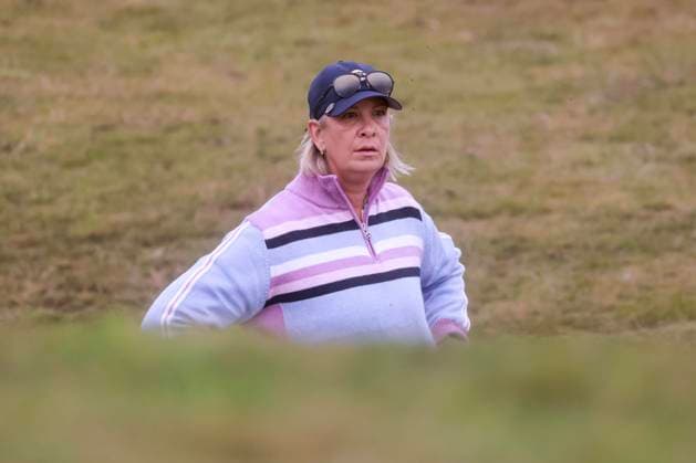 3rd October 2025; Kingsbarns Golf Links, St Andrews, Fife, Scotland; Alfred Dunhill Links Golf Championship, Round Two; Angie Watson, wife of Bubba Watson, checks the line of her shot from the rough on the tenth hole at Kingsbarns Golf Links during the second round of the Alfred Dunhill Links Championship  DavidxYoung
