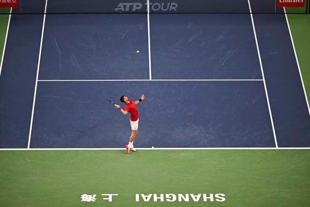 (251003) -- SHANGHAI, Oct. 3, 2025 -- Novak Djokovic serves during the men s singles round of 64 match between Novak Djokovic of Serbia and Borna Coric of Croatia at the ATP, Tennis Herren World Tour Shanghai Masters tennis tournament in Shanghai, east China, Oct. 3, 2025. ) (SP)CHINA-SHANGHAI-TENNIS-ATP TOUR-SHANGHAI MASTERS-MEN S SINGLES (CN) ChenxHaoming 