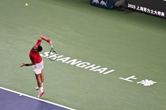 (251003) -- SHANGHAI, Oct. 3, 2025 -- Novak Djokovic serves during the men s singles round of 64 match between Novak Djokovic of Serbia and Borna Coric of Croatia at the ATP, Tennis Herren World Tour Shanghai Masters tennis tournament in Shanghai, east China, Oct. 3, 2025. ) (SP)CHINA-SHANGHAI-TENNIS-ATP TOUR-SHANGHAI MASTERS-MEN S SINGLES (CN) ChenxHaoming 