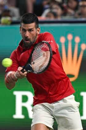 (251003) -- SHANGHAI, Oct. 3, 2025 -- Novak Djokovic hits a return during the men s singles round of 64 match between Novak Djokovic of Serbia and Borna Coric of Croatia at the ATP, Tennis Herren World Tour Shanghai Masters tennis tournament in Shanghai, east China, Oct. 3, 2025. ) (SP)CHINA-SHANGHAI-TENNIS-ATP TOUR-SHANGHAI MASTERS-MEN S SINGLES (CN) ChenxHaoming 