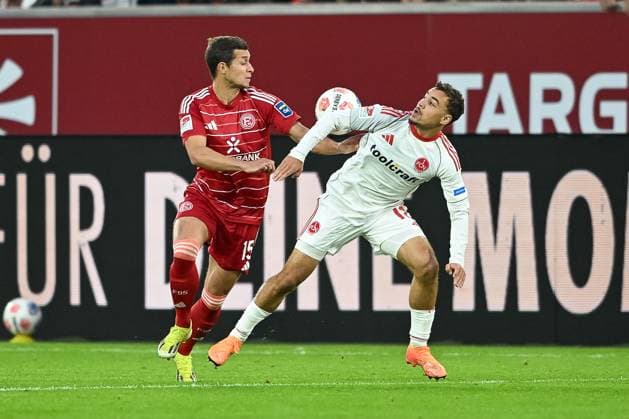 03 10 2025, Soccer 2 Bundesliga, Season 2025 2026, 08 Matchday, Fortuna Duesseldorf 1 FC Nuernberg in the Merkur Spiel Arena in Duesseldorf duel between Tim Oberdorf Fortuna Duesseldorf, 15 and Rafael Lubach 1 FC Nuernberg, 18 Important note In accordance with the regulations of the DFL German Football League and the DFB German Football Association, it is prohibited to utilize or have utilized photographs taken in the stadium or of the match in the form of sequential images or video-like photo series Foto Kirchner Media Thomas Haesler Copyright: xKirchner-Media ThomasxHaeslerx