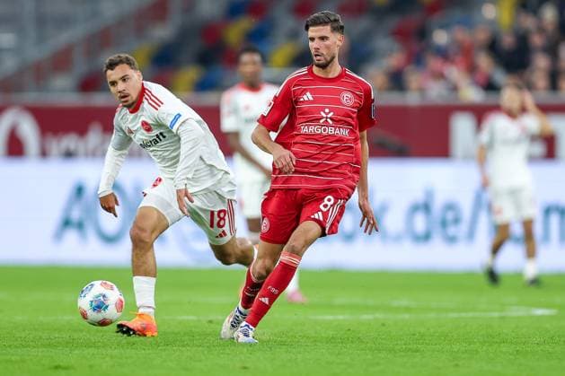 03 10 2025, Football, Fortuna Düsseldorf 1 FC Nürnberg, 2 Fußball Bundesliga, Merkur Spiel Arena, Saison 2025 2026 Rafael Lubach 1FC Nuernberg 18 in duel against Anouar El Azzouzi Fortuna Düsseldorf 08 DFB regulations prohibit any use of photographs as image sequences and or quasi video Nordrhein Westfalen Germany