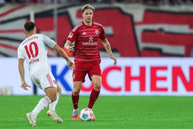 Soccer 2 Bundesliga 8 Matchday Fortuna Düsseldorf 1 FC Nürnberg on 03 10 2025 at Merkur Spiel Arena in Düsseldorf Julian Justvan Nürnberg , left Tim Rossmann Düsseldorf , right DFL regulations prohibit any use of photographs as image sequences and or quasi video xJRx