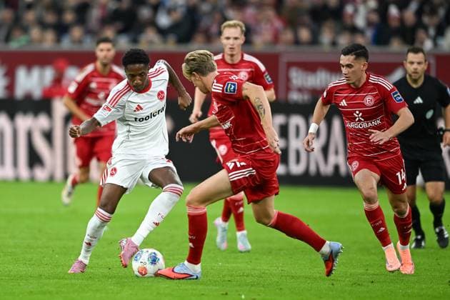 03 10 2025, Soccer 2 Bundesliga, Season 2025 2026, 08 Matchday, Fortuna Duesseldorf 1 FC Nuernberg in the Merkur Spiel Arena in Duesseldorf duel between Pape Demba Diop 1 FC Nuernberg, 20 and Jesper Daland Fortuna Duesseldorf, 02 Important note In accordance with the regulations of the DFL German Football League and the DFB German Football Association, it is prohibited to utilize or have utilized photographs taken in the stadium and or of the match in the form of sequential images and or video-like photo series Foto Kirchner Media Thomas Haesler Copyright: xKirchner-Media ThomasxHaeslerx