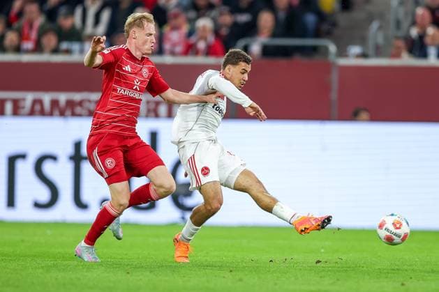 03 10 2025, Football, Fortuna Düsseldorf 1 FC Nürnberg, 2 Fußball Bundesliga, Merkur Spiel Arena, Saison 2025 2026 Goal shot to score 1 0 by scorer Rafael Lubach 1FC Nuernberg 18 against Giovanni Haag Fortuna Düsseldorf 06 DFB regulations prohibit any use of photographs as image sequences and or quasi video Nordrhein Westfalen Germany